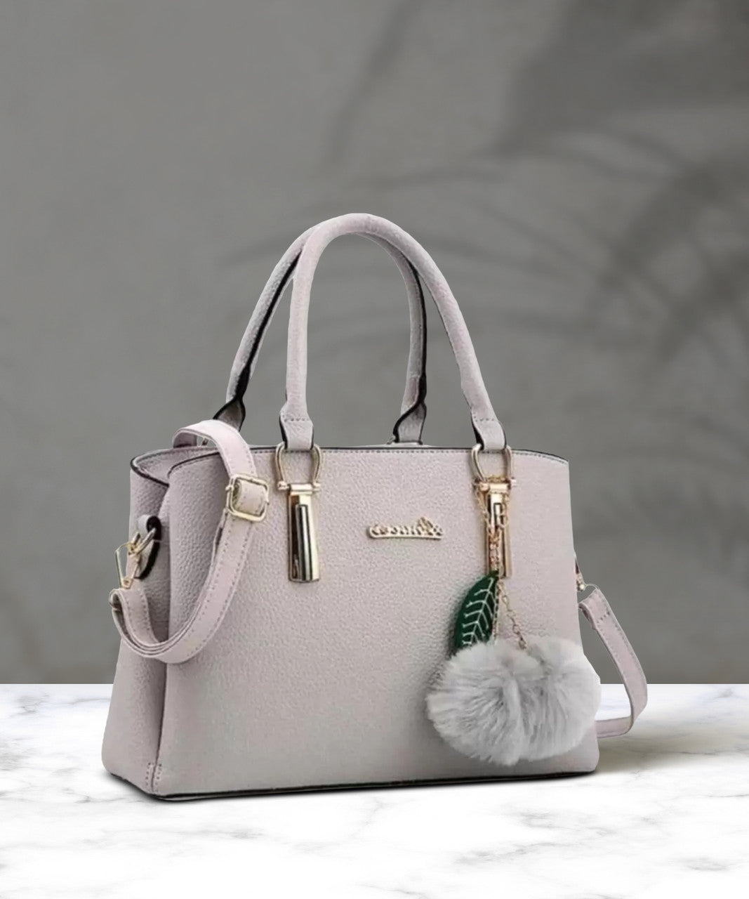 Stylish Pink PU Leather Handbag for Women | Adjustable Handle, Golden Buckle & Pom-Pom Charm